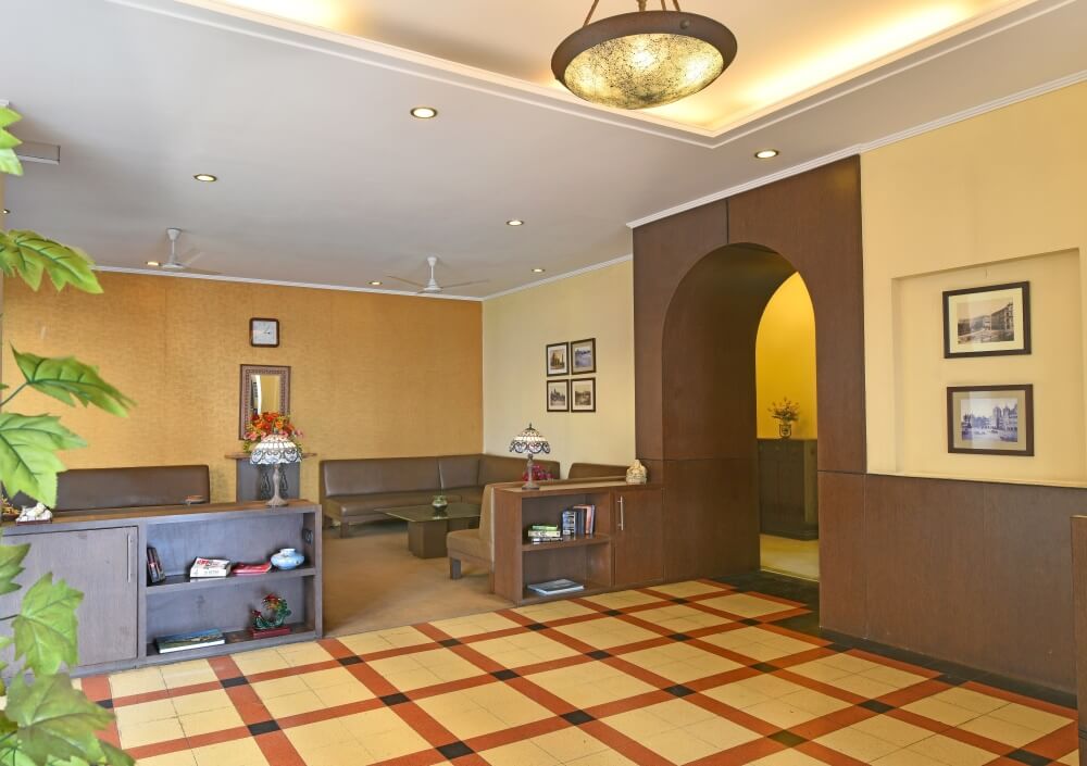 Budget-friendly hotel room with a cozy and inviting atmosphere, providing a comfortable stay at an affordable price